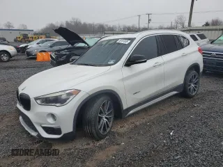 2016 BMW X1 xDrive28i with VIN WBXHT3C36GP881275, listed as a Copart auction lot 49181055 with 129,469 mi miles and Salvage Title. Bid and sale history available at carsss.com. Image 1.