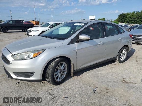 2015 Ford Focus SE with VIN 1FADP3F28FL234097, listed as a Copart auction lot 62660245 with 120,100 mi miles and Salvage title. Bid and sale history available at DreamBid. Image 1.