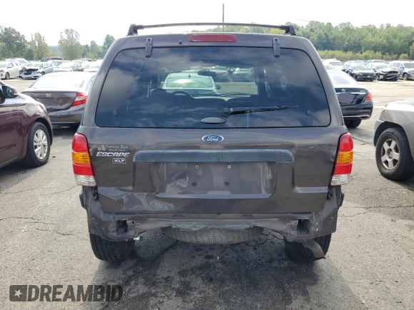 2006 Ford Escape XLT with VIN 1FMYU03Z86KB56863, listed as a Copart auction lot 72385544 with 111,800 mi miles and Salvage Title. Bid and sale history available at carsss.com. Image 6.