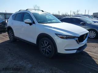 2018 Mazda CX-5 Grand Touring with VIN JM3KFBDM6J0332372, listed as a IAAI auction lot 41670058 with NaN miles. Bid and sale history available at carsss.com. Image 1.