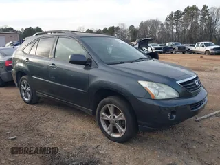 2007 Lexus RX 400h z VIN JTJGW31U372002594, wystawiony jako IAAI lot #41380924 z przebiegiem 243 928 mil mil oraz . Historia ofert i sprzedaży dostępna na DreamBid. Obrazek 1.