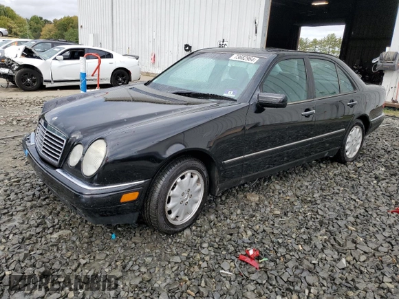 1999 Mercedes-Benz E-Class with VIN WDBJF65H4XA883351, listed as a Copart auction lot 73682964 with 156,446 mi miles and Salvage Title. Bid and sale history available at carsss.com. Image 1.