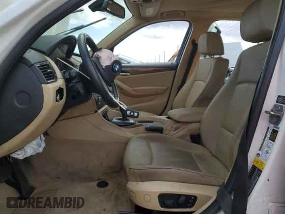 2013 BMW X1 28i with VIN WBAVM1C54DVW42668, listed as a Copart auction lot 47722045 with 71,450 mi miles and Salvage Title. Bid and sale history available at carsss.com. Image 7.