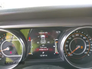 2023 Jeep Wrangler Sport with VIN 1C4HJXDG5PW693865, listed as a IAAI auction lot 40068881 with 12,149 mi miles and . Bid and sale history available at DreamBid. Image 7.