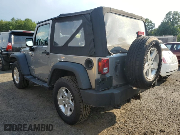 2013 Jeep Wrangler Sport with VIN 1C4AJWAG7DL635639, listed as a Copart auction lot 67182975 with 101,576 mi miles and Clean title. Bid and sale history available at DreamBid. Image 2.