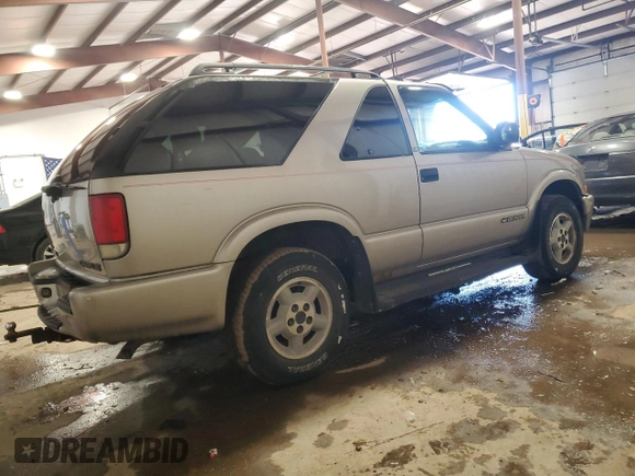 1999 Chevrolet Blazer LS with VIN 1GNCT18W8XK128169, listed as a Copart auction lot 44260965 with 104,790 mi miles and Salvage title. Bid and sale history available at DreamBid. Image 3.