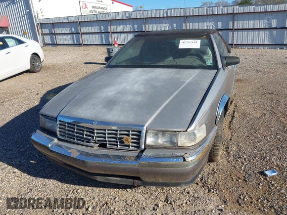 1992 Cadillac Seville z VIN 1G6EL13B2N0612154, wystawiony jako IAAI lot #41757101 z przebiegiem Nie podano mil oraz . Historia ofert i sprzedaży dostępna na DreamBid. Obrazek 13.