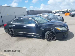 2016 Nissan Altima SR with VIN 1N4AL3AP2GC142213, listed as a IAAI auction lot 41946863 with 100,858 mi miles and . Bid and sale history available at carsss.com. Image 13.