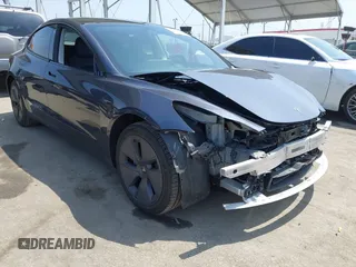 2023 Tesla Model 3 with VIN 5YJ3E1EA1PF403714, listed as a IAAI auction lot 42359581 with 30,853 mi miles and . Bid and sale history available at DreamBid. Image 1.