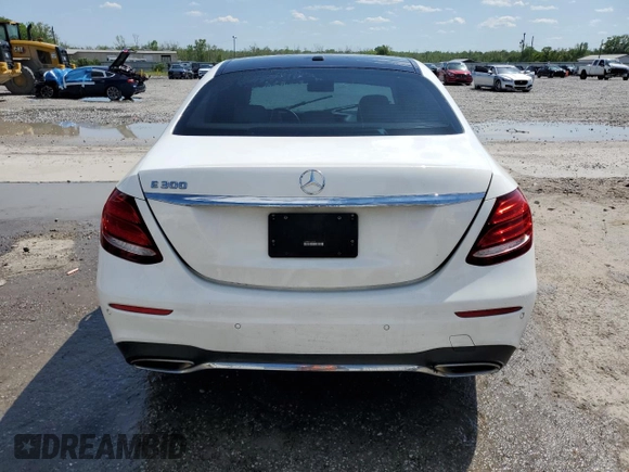 2017 Mercedes-Benz E 300 Luxury with VIN WDDZF4JB3HA074523, listed as a Copart auction lot 52314735 with 130,619 mi miles and Salvage Title. Bid and sale history available at DreamBid. Image 6.