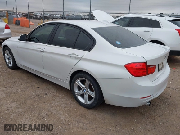 2015 BMW 3 Series 320i with VIN WBA3B1C5XFK140734, listed as a IAAI auction lot 42141319 with 84,863 mi miles and . Bid and sale history available at DreamBid. Image 3.
