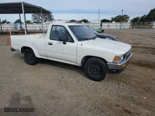 1993 Toyota 2WD Pickups DX with VIN JT4RN81P4P5168613, listed as a Copart auction lot 82611524 with 200,408 mi miles and Clean Title. Bid and sale history available at carsss.com. Image 4.