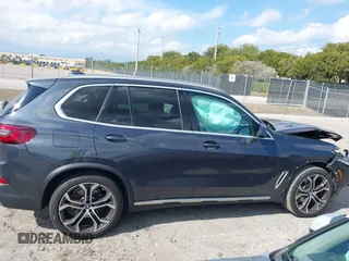 2021 BMW X5 sDrive40i with VIN 5UXCR4C01M9G07906, listed as a IAAI auction lot 41847036 with 16,307 mi miles. Bid and sale history available at carsss.com. Image 14.