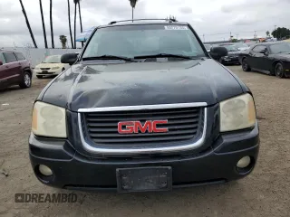 2004 GMC Envoy SLE with VIN 1GKDT13S442155788, listed as a Copart auction lot 50270135 with 164,271 mi miles and Salvage Title. Bid and sale history available at carsss.com. Image 5.