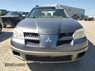 2005 Mitsubishi Outlander LS z VIN JA4LZ31F45U604202, wystawiony jako Copart lot #58969315 z przebiegiem 195 950 mil mil oraz Czysty tytuł • Clean title. Historia ofert i sprzedaży dostępna na DreamBid. Obrazek 5.