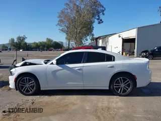 2019 Dodge Charger SXT with VIN 2C3CDXJGXKH533322, listed as a IAAI auction lot 41808838 with 95,877 mi miles and . Bid and sale history available at DreamBid. Image 15.