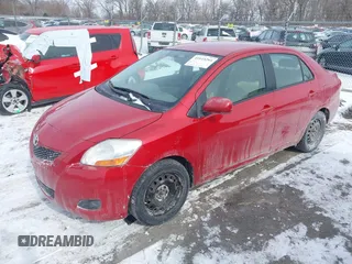 2009 Toyota Yaris with VIN JTDBT903991314767, listed as a IAAI auction lot 41615264 with 252,957 mi miles. Bid and sale history available at carsss.com. Image 17.