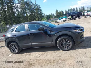 2023 Mazda CX-30 S z VIN 3MVDMBAM0PM519901, wystawiony jako IAAI lot #42255344 z przebiegiem 20 839 mil mil oraz . Historia ofert i sprzedaży dostępna na DreamBid. Obrazek 13.