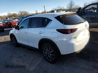 2018 Mazda CX-5 Grand Touring z VIN JM3KFBDM6J0337006, wystawiony jako Copart lot #87155694 z przebiegiem 50 643 mil mil oraz Szkoda całkowita • Salvage title. Historia ofert i sprzedaży dostępna na DreamBid. Obrazek 2.