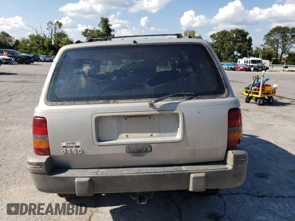 1994 Jeep Grand Cherokee Laredo z VIN 1J4GZ58S5RC328902, wystawiony jako Copart lot #70150474 z przebiegiem 195 604 mil mil oraz Szkoda całkowita • Salvage title. Historia ofert i sprzedaży dostępna na DreamBid. Obrazek 6.