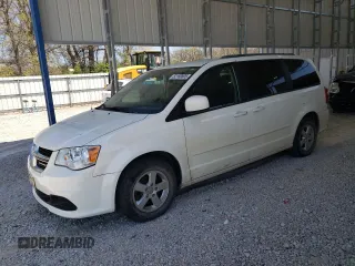 2013 Dodge Grand Caravan SXT with VIN 2C4RDGCG5DR554126, listed as a Copart auction lot 52160805 with 201,161 mi miles and Salvage Title. Bid and sale history available at DreamBid. Image 1.