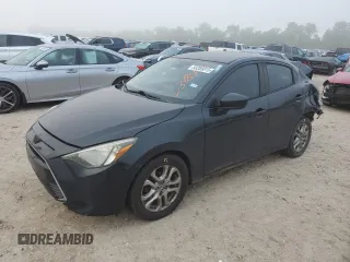 2016 Scion iA z VIN 3MYDLBZV8GY100948, wystawiony jako Copart lot #53285015 z przebiegiem 192 027 mil mil oraz Szkody całkowita. Historia ofert i sprzedaży dostępna na DreamBid. Obrazek 1.