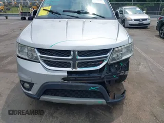2012 Dodge Journey SXT z VIN 3C4PDCBGXCT324756, wystawiony jako IAAI lot #42422533 z przebiegiem 241 934 mil mil oraz . Historia ofert i sprzedaży dostępna na DreamBid. Obrazek 12.