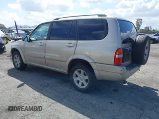 2003 Suzuki XL-7 Touring with VIN JS3TX92V634107042, listed as a IAAI auction lot 41902576 with 176,439 mi miles. Bid and sale history available at carsss.com. Image 3.