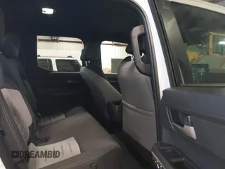 2025 Toyota Tacoma SR with VIN 3TMLB5JN2SM090394, listed as a IAAI auction lot 41916312 with 840 mi miles and . Bid and sale history available at DreamBid. Image 8.