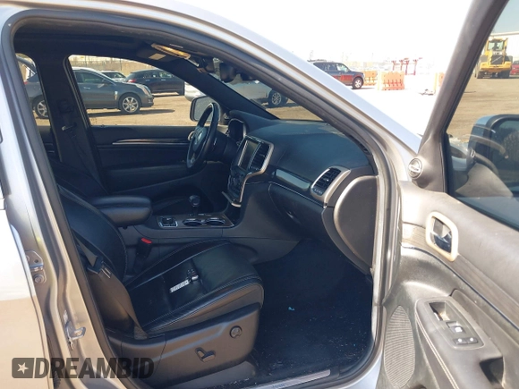 2014 Jeep Grand Cherokee Overland with VIN 1C4RJFCT9EC231840, listed as a IAAI auction lot 42114284 with 170,691 mi miles and . Bid and sale history available at DreamBid. Image 5.