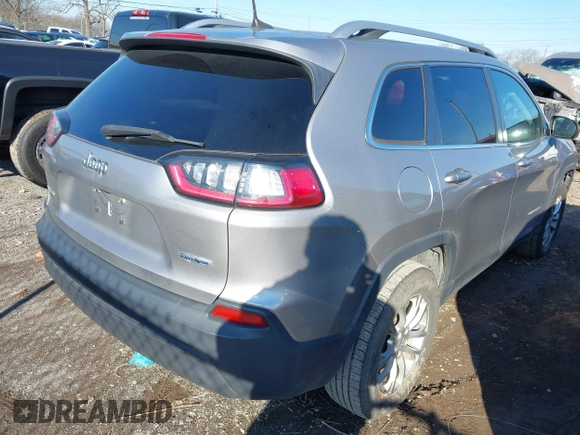 2019 Jeep Cherokee Latitude with VIN 1C4PJMCB8KD167282, listed as a IAAI auction lot 41154149 with 142,664 mi miles. Bid and sale history available at carsss.com. Image 4.