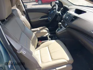 2014 Honda CR-V EX-L with VIN 2HKRM3H74EH533638, listed as a IAAI auction lot 41972083 with 165,663 mi miles and . Bid and sale history available at carsss.com. Image 5.