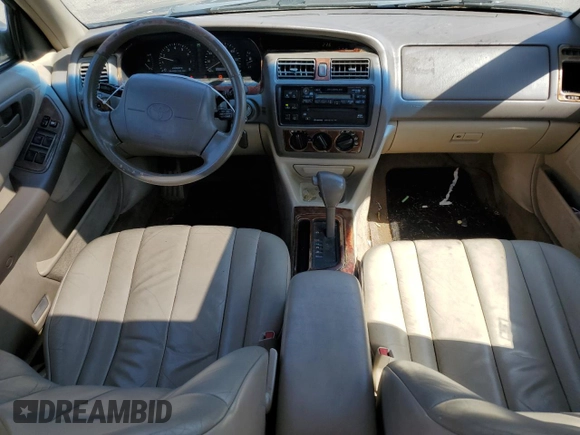 1998 Toyota Avalon XL with VIN 4T1BF18BXWU228989, listed as a Copart auction lot 53821495 with 157,209 mi miles and Salvage Title. Bid and sale history available at DreamBid. Image 8.