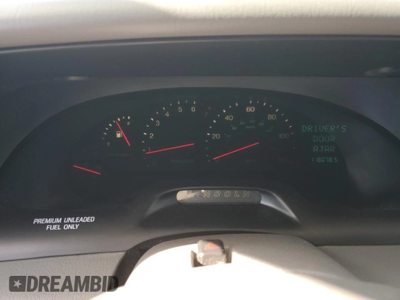 1996 Lincoln Continental z VIN 1LNLM97V3TY627803, wystawiony jako Copart lot #87036654 z przebiegiem 118 078 mil mil oraz Szkoda całkowita • Salvage title. Historia ofert i sprzedaży dostępna na DreamBid. Obrazek 9.