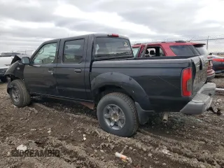 2004 Nissan Frontier XE z VIN 1N6ED27T04C465904, wystawiony jako Copart lot #84096194 z przebiegiem 194 275 mil mil oraz Szkoda całkowita • Salvage title. Historia ofert i sprzedaży dostępna na DreamBid. Obrazek 2.