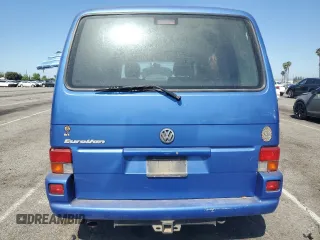 2003 Volkswagen EuroVan с VIN WV2KB470X3H028721, выставлен на аукционе Copart как лот 57531425 с пробегом 233 629 миль миль и Чистый • Clean title. История ставок и продаж доступна на DreamBid. Изображение 6.