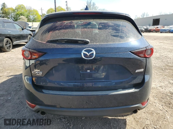 2017 Mazda CX-5 Touring with VIN JM3KFBCL4H0214579, listed as a Copart auction lot 54256775 with 95,541 mi miles and Clean Title. Bid and sale history available at carsss.com. Image 6.