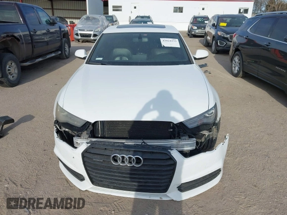 2017 Audi A6 Premium z VIN WAUF8AFC1HN100842, wystawiony jako IAAI lot #42024333 z przebiegiem 89 275 mil mil oraz . Historia ofert i sprzedaży dostępna na DreamBid. Obrazek 13.
