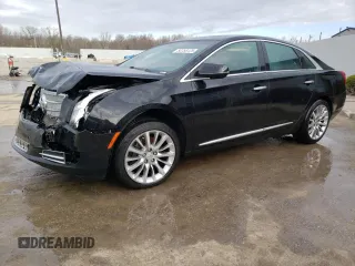 2013 Cadillac XTS Platinum z VIN 2G61V5S35D9195702, wystawiony jako Copart lot #50758125 z przebiegiem 210 949 mil mil oraz Nie do naprawy. Historia ofert i sprzedaży dostępna na DreamBid. Obrazek 1.