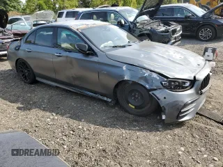 2022 Mercedes-Benz E 53 AMG with VIN W1KZF6BBXNB008261, listed as a Copart auction lot 72121074 with 27,864 mi miles and Salvage Title. Bid and sale history available at DreamBid. Image 4.