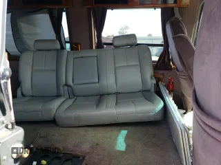 1994 Chevrolet Chevy Van z VIN 1GBEG25K5RF123489, wystawiony jako Copart lot #79491854 z przebiegiem 82 970 mil mil oraz Szkoda całkowita • Salvage title. Historia ofert i sprzedaży dostępna na DreamBid. Obrazek 11.