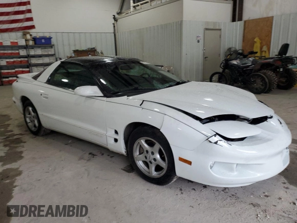 1998 Pontiac Firebird Firebird z VIN 2G2FS22KXW2207621, wystawiony jako Copart lot #82717434 z przebiegiem 63 973 mil mil oraz Szkoda całkowita • Salvage title. Historia ofert i sprzedaży dostępna na DreamBid. Obrazek 4.