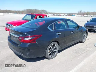 2018 Nissan Altima SV with VIN 1N4AL3AP5JC285843, listed as a IAAI auction lot 41956374 with 100,688 mi miles and . Bid and sale history available at carsss.com. Image 4.