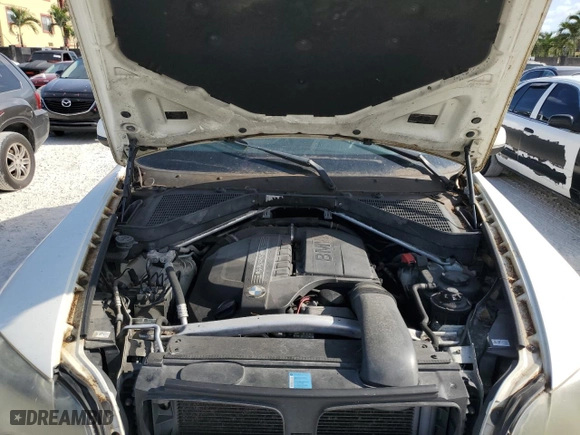 2011 BMW X5 35i with VIN 5UXZV4C55BL407979, listed as a Copart auction lot 53757955 with 165,895 mi miles and Clean Title. Bid and sale history available at carsss.com. Image 11.