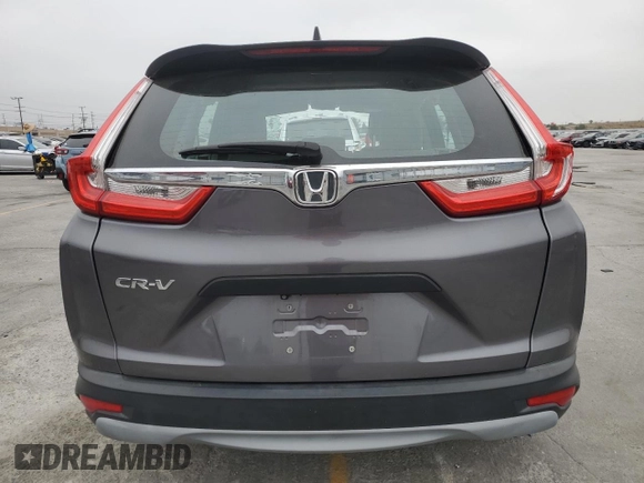2017 Honda CR-V LX z VIN 2HKRW5H3XHH402429, wystawiony jako Copart lot #57440845 z przebiegiem 17 617 mil mil oraz Szkoda całkowita • Salvage title. Historia ofert i sprzedaży dostępna na DreamBid. Obrazek 6.