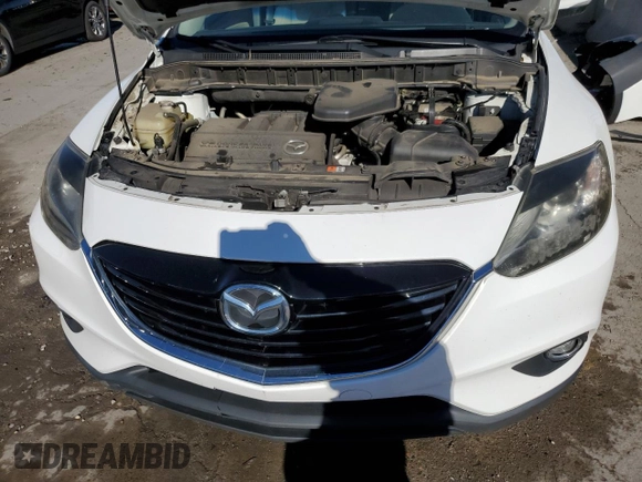 2015 Mazda CX-9 Grand Touring с VIN JM3TB2DA1F0462203, выставлен на аукционе Copart как лот 37073714 с пробегом 101 293 миль миль и Списание • Salvage title. История ставок и продаж доступна на DreamBid. Изображение 12.