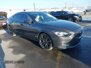 2014 Mazda 6 i Grand Touring with VIN JM1GJ1W51E1101523, listed as a IAAI auction lot 41868452 with 147,667 mi miles. Bid and sale history available at carsss.com. Image 1.