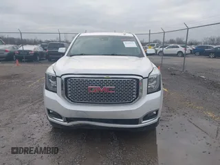 2016 GMC Yukon XL Denali with VIN 1GKS2HKJ9GR264481, listed as a IAAI auction lot 41764272 with 114,852 mi miles. Bid and sale history available at carsss.com. Image 12.