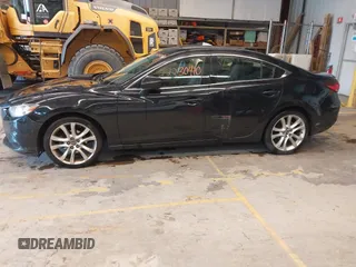 2015 Mazda 6 i Touring with VIN JM1GJ1V6XF1163952, listed as a IAAI auction lot 42230410 with 148,177 mi miles and . Bid and sale history available at carsss.com. Image 14.