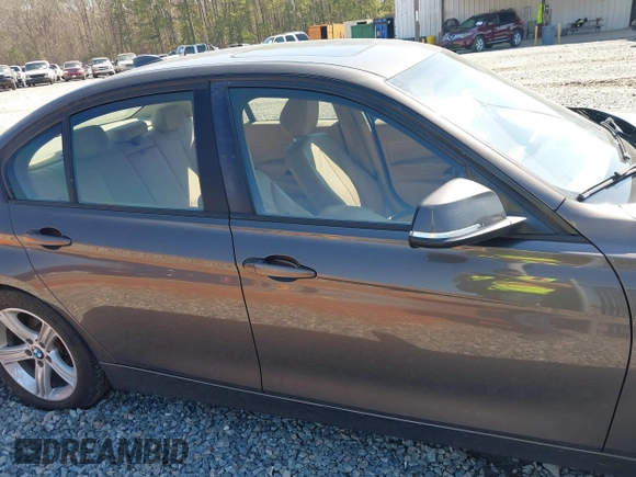 2014 BMW 3 Series 328i with VIN WBA3A5G57ENP28138, listed as a IAAI auction lot 41760371 with 147,897 mi miles and . Bid and sale history available at DreamBid. Image 12.